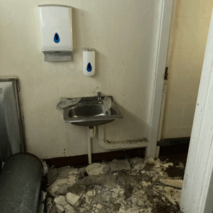Collapsed ceiling plaster and plasterboard.