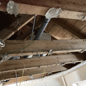 Collapsed ceiling due to water damage.